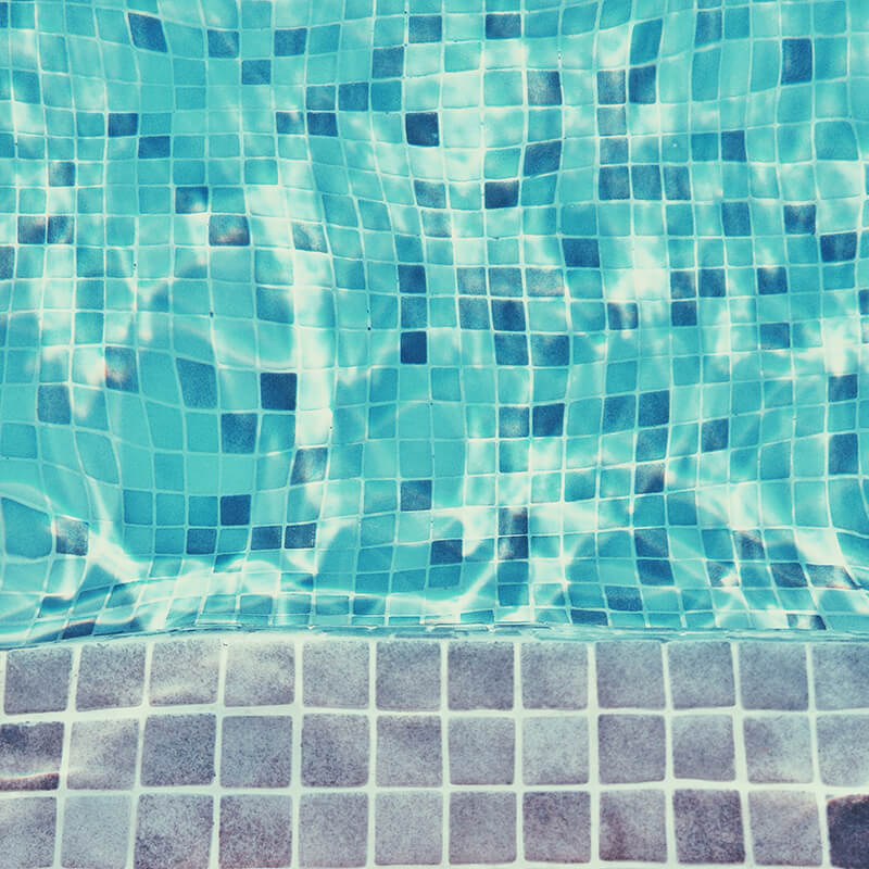 Installing coping materials that enhance your pool's safety.