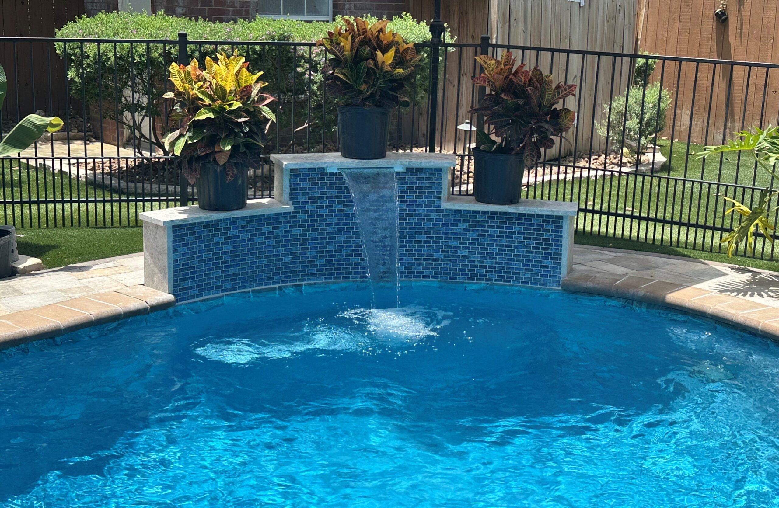 Beautiful swimming pool completed through expert pool renovations services.